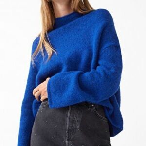 Nicole Miller 100% Merino wool role neck sweater